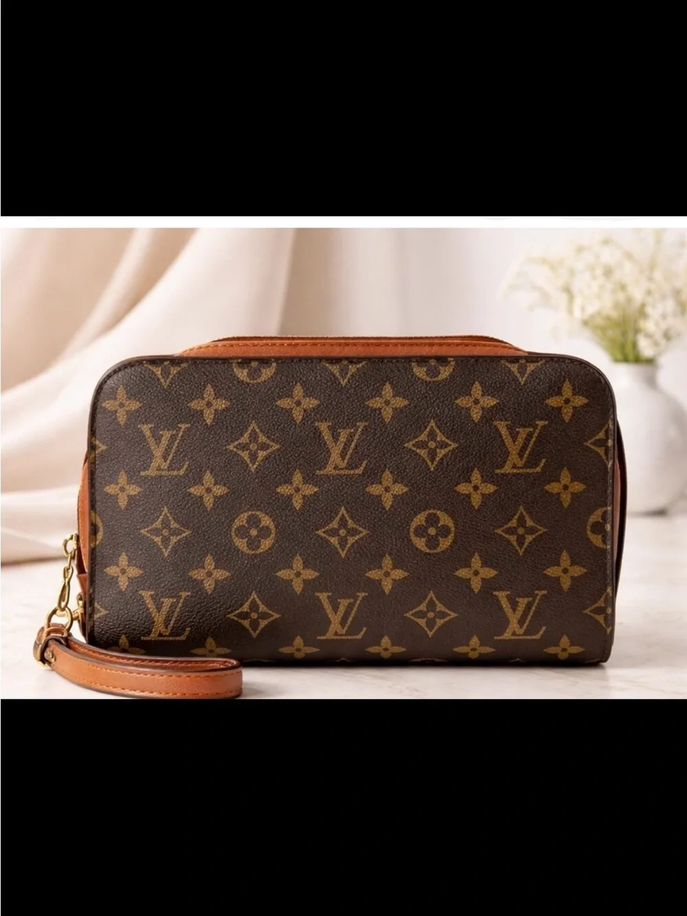 Louis Vuitton Orsay Monogram Wristlet